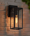 Dope Mystic Black Outdoor Wall Light With Clear Glass Panel on brick wall, 14 1/4 Inch Tall, 7 Inch Projection, Exterior Lighting for Porch