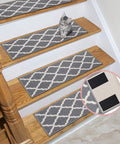 Kitten on stairs with gray patterned stair treads, inset showing 2x4 Inch Self Adhesive Hook And Loop Tape Set, Industrial Strength Sticky Back Fasteners.