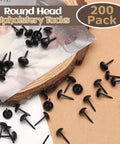 Top Shelf Black Round Head Upholstery Tacks 200 Pack 7X13Mm Metal Thumb Pins on wooden surface, ideal for crafts.