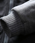 Heavyweight Fleece Hoodie For Men Full Zip With Warm Lining showing a close-up of the ribbed cuff design in dark gray fabric.