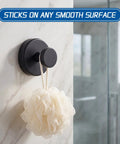Straight Up The Go To Suction Cup Hooks For Shower on smooth marble holding a shower loofah, practical and sleek bathroom storage.
