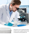 Laboratory worker using microscope with Premium Aluminum Test Tube Rack Stand For Lab Safety Small Test Tubes Metal Holder.
