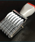 Kickass Six Digit Number Roller Stamp With Changeable Price Date Wheels For Custom Scrapbooking And Office Projects Slick Rubber Rolling Seal Tool viewed from the top.