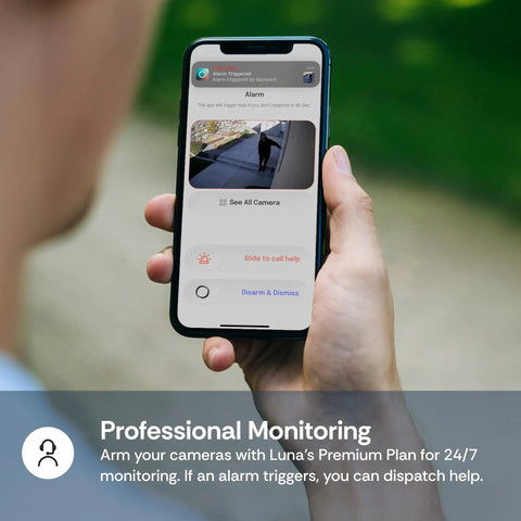 Person holding phone displaying app interface for 3MP 2K Window Camera With Color Night Vision AI Motion Alerts And Easy Stick On Glass Mount
