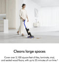 Person using WashG1 Wet Cleaner For Hard Floors With Dual Motorized Rollers And Microfiber Pads on modern living room tiles