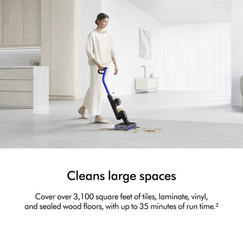 Person using WashG1 Wet Cleaner For Hard Floors With Dual Motorized Rollers And Microfiber Pads on modern living room tiles