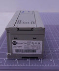 Series E MicroLogix 1000 Programmable Controller 1761-L32BWA with labeled panel on cutting mat.