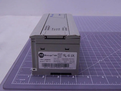 Series E MicroLogix 1000 Programmable Controller 1761-L32BWA with labeled panel on cutting mat.