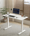 55 Inch Electric Height Adjustable Standing Desk Ultra Quiet Sit To Stand Work Table White Ergonomic Office Setup with computer and decor