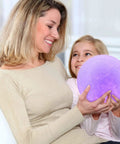 Woman and child holding Moon Lamp 7 Inch 3D Printed Moon Light With Stand, 16 Color LED Night Light glowing purple
