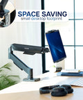 Level Up Your Workspace With This Height Adjustable Counterbalance Desk Mount For Tablets And 15 6 Inch Two In One Laptops Slick Spring Loaded Arm Rock Solid Grip Smooth Glide Finish Black mounted on desk with small footprint.