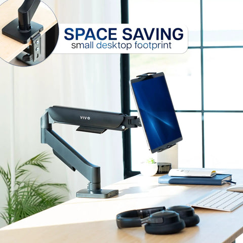 Level Up Your Workspace With This Height Adjustable Counterbalance Desk Mount For Tablets And 15 6 Inch Two In One Laptops Slick Spring Loaded Arm Rock Solid Grip Smooth Glide Finish Black mounted on desk with small footprint.
