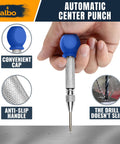 Hand holding Spring Loaded Center Punch Tool 5 Inch Automatic Drill Punch For Metal Wood And Steel With No Slip Comfort Grip