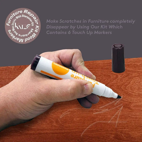 Hand using marker from 13 Piece Wood Stain and Scratch Repair Kit for Furniture With Markers and Wax Sticks Quick Fix for Scratches on wood.