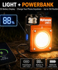 Portable Camping Light 3500LM LED Lantern Rechargeable With 2.5 To 15 Hour Runtime USB C Power Adjustable Brightness Alloy Waterproof Camp Light For Power Outages Emergency Hurricane 2 Pack Orange showing battery and phone charging.