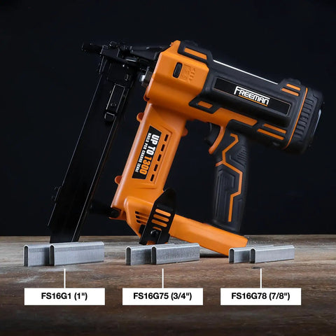 Hardcore 20V Cordless Fencing Stapler Kit Bundled With 16 Gauge 1 Inch Staples laid on a wooden surface with multiple staples.
