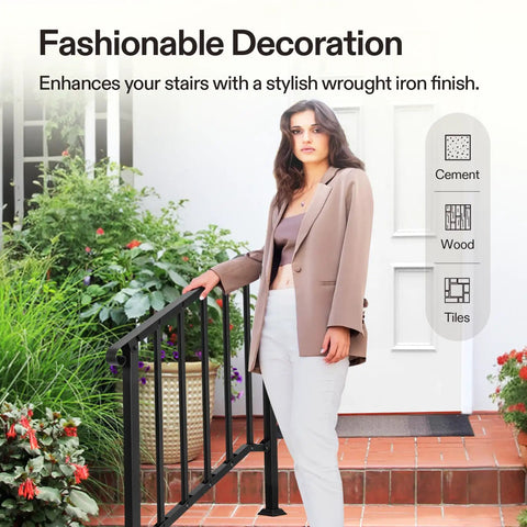 Heavy Duty Three Step Wrought Iron Handrail With Curved Metal Balusters In Matte Black Finish Perfect For Outdoor Deck Stairs And Porches That Looks Solid And Works Like A Charm, shown on stairs with plants.