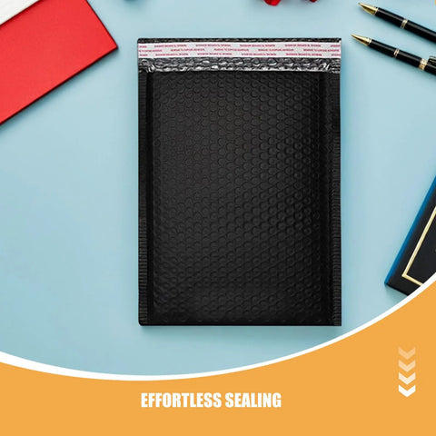 50 Pack Black PE Bubble Mailers With Self Seal Closure, Padded Shipping Envelopes For Ecommerce shown on a desk
