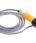 Diffuse Reflection Infrared Obstacle Avoidance Sensor with adjustable range, cable and housing visible, used in automation and robotics.