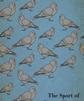 Cover of 'Sport Of Pigeon Racing A Real Deal Guide For Serious Fanciers' by W. Anderson with illustrated pigeons on blue background.