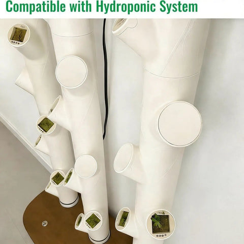 Hydroponic Tower Pipe Cap And Plant Spacer Kit installed on vertical garden pipes with snap-fit connectors in greenhouse setup.