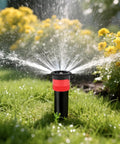 Heavy Duty 10 Pack Variable Arc Sprinkler Head Replacement For Pop Up Irrigation Nozzles watering garden with flowers.