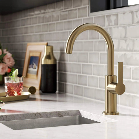 Oletto Single Handle Kitchen Bar Faucet In Spot Free Antique Champagne Bronze with 12 inch tall body, installed in modern kitchen