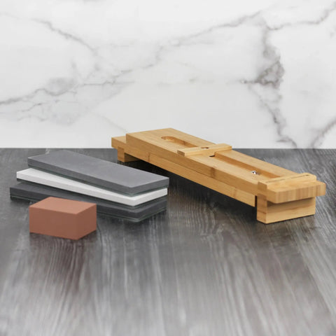 Zwilling 3000 Grit Glass Water Sharpening Stone displayed with holder on grey surface
