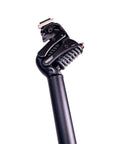 Close-up of XR suspension seatpost for road, gravel and e-bikes with lightweight aluminum build, adjustable springs visible.