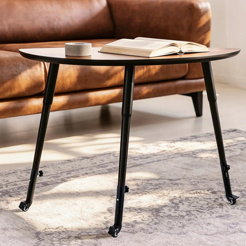 Top Tier Heavy Duty Table Leg Extenders With Casters Four Pack Adjustable Height Risers on a stylish coffee table.