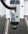 Close-up of spindle on Rotary Axis 4 Axis CNC Router With 4x8 Engraving Milling Machine for 3D wood foam sculpture.