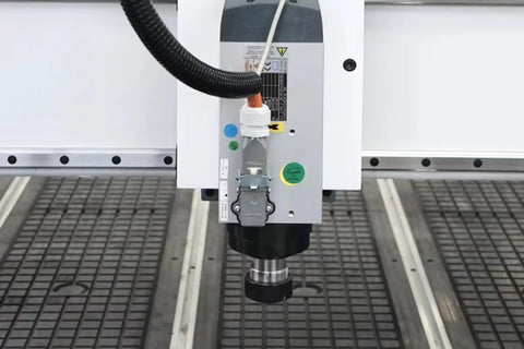 Close-up of spindle on Rotary Axis 4 Axis CNC Router With 4x8 Engraving Milling Machine for 3D wood foam sculpture.