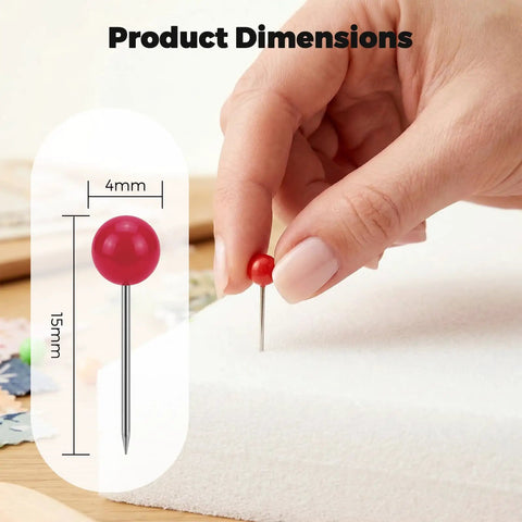 Close-up of a hand using a red Straight Up Go To Multi Color Map Push Pin on a foam surface, showcasing product dimensions.