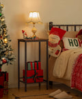 Built Tough Industrial Tall Side Table Featuring Adjustable Mesh Shelves And Rugged Steel Frame Works Like A Charm As A Tall Nightstand For Your Rustic Brown Living Room Setup next to Christmas tree and bed.