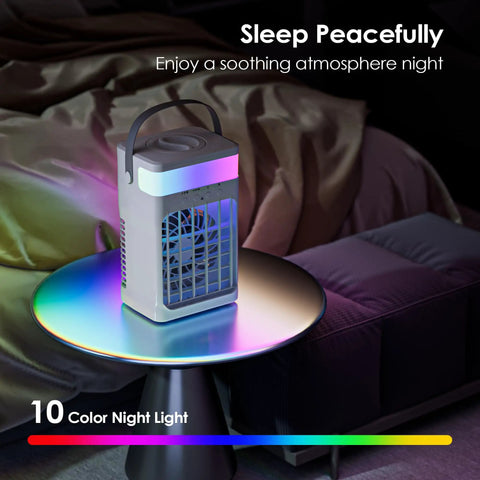 Compact Portable Personal Cooling Fan With Remote Control on nightstand with color night light in bedroom setting