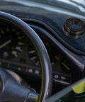 Racing Car Wheel Adapter Plate Riser Tool For Enhanced Control In Various Racing Cars on dashboard near steering wheel