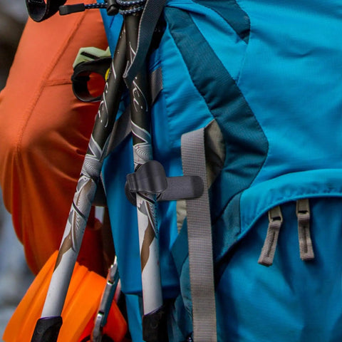 Blue backpack with Three Piece Hydration Hose Magnetic Clip Set For Water Tube Bladder Clip Keeps Drinking Valve Tube In Place
