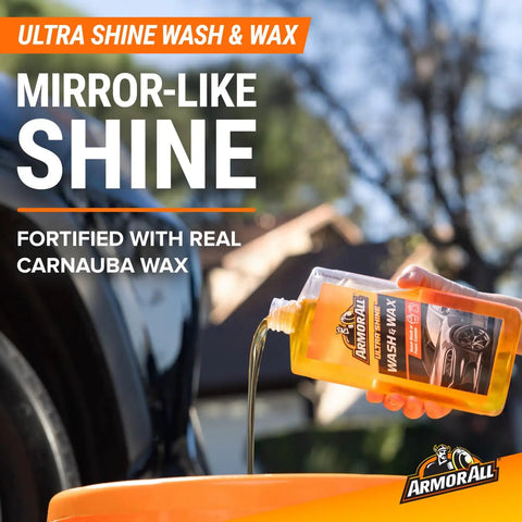 All in One Eight Piece Car Care Kit With Extreme Tire Shine And Ultra Shine Wash And Wax bottle pouring into bucket