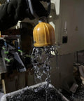 Powerful Magnetic Pickup Tool With Quick Release Lifter lifting metal scraps in workshop