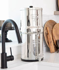Gravity-Fed Water Filter System With Two High-Capacity Filtration Elements and 7-Inch Stainless Steel Spigot on kitchen countertop