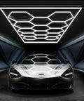 Hexagon Garage Light With Rectangle Frame, Pro Grade Brightness 672W 86400 Lumens 6500K illuminating a car in a garage