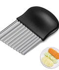 Angled front view of black-handled stainless steel crinkle cutter for potato, carrot, and vegetable slicing.