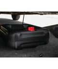Two In One 16 Quart Oil Drain Container With Deep Drain Well Integrated Handle And Sealing Rubber Gaskets Black Heavy Duty Oil Catcher in use under vehicle