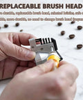 Hands installing a replaceable brush head for Electric Portafilter Cleaner Automatic Espresso Puck Sucker With Smart Sensor Induction And Three Durable Brush Heads Quiet Knock Box.