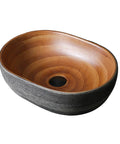 SDVantage Countertop Bathroom Sinks Ceramic Carving/Oval Bathroom Sink Handmade Countertop Vessel Bathroom Sink 15.7 X 10.6 X 5.1 Inches Bathroom Vanity Sinks Basin with natural wooden finish and black exterior.