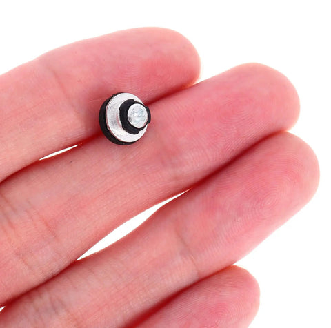 Close-up of Ten Piece Laptop Hard Drive Screws Kit M3 miniature black screw held in hand, for HDD repair and PC hardware maintenance.