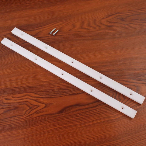 Two white UHMW miter bars, 17 in long, 3/4 in tall by 3/8 in wide, with predrilled holes and screws