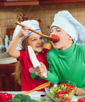 Wooden kids kitchen knife set with blue accents; children wearing chef hats cooking in a kitchen.