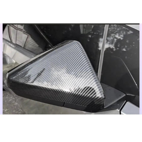 Grab These Heavy Duty Side View Mirror Caps For Tesla Cybertruck featuring durable ABS plastic and sleek carbon fiber weave exterior.