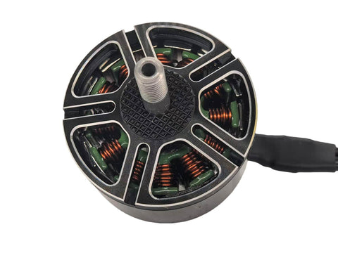 Close-up of 900Kv Brushless Drone Motor for Multirotors with 3 to 6S battery, 9 to 11 inch propeller, outer rotor design.